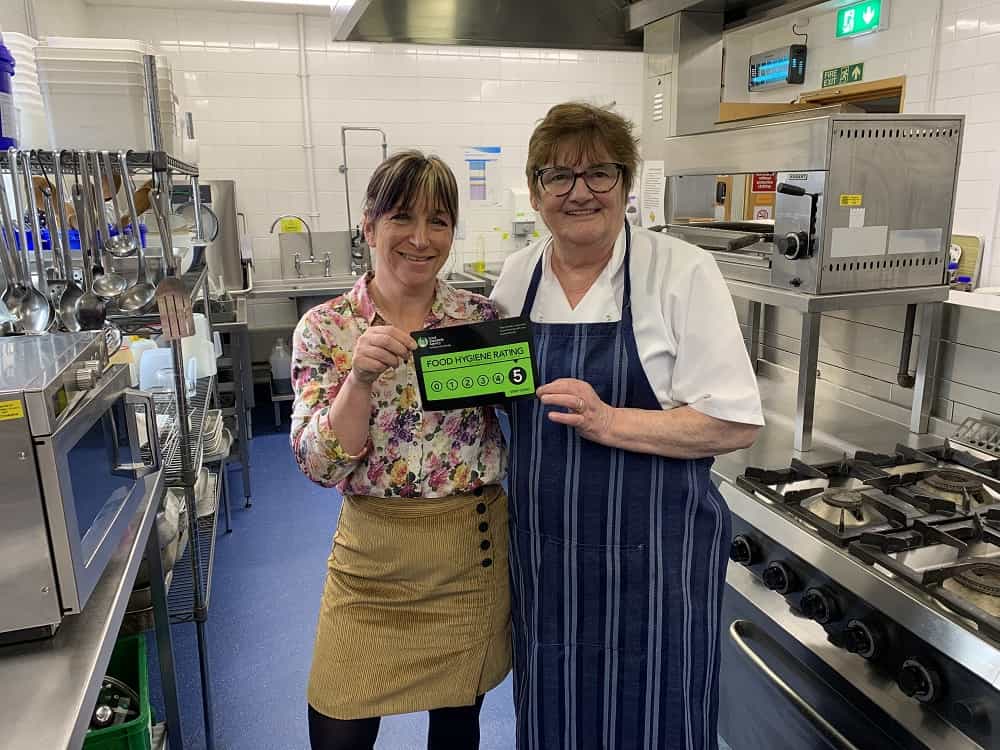 Catering staff in hospice kitchen