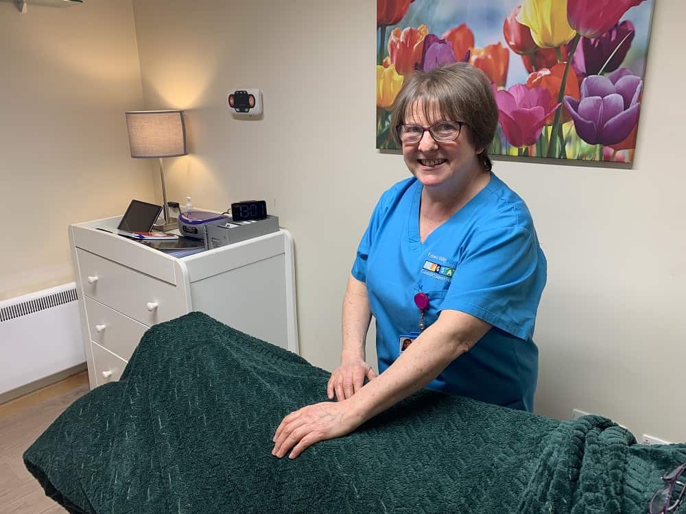 Volunteer Fedella Marsden in the therapy room