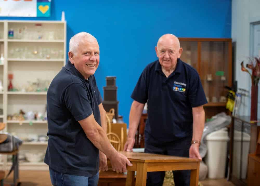 Volunteers volunteering in the furniture in the shop in Carlisle