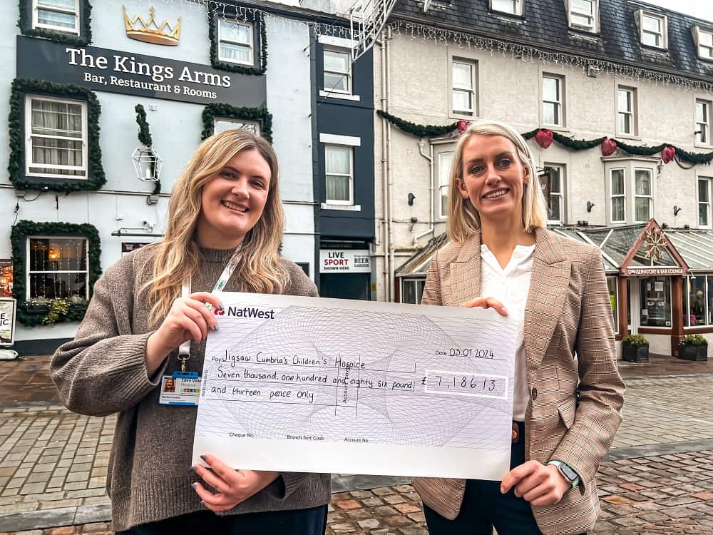 Lake District Hotels hand over money raised from 2023 charity of the year partnership. Pictured is Martha Pardoe, hospice fundraiser and Dani Hope, director of Lake District Hotels