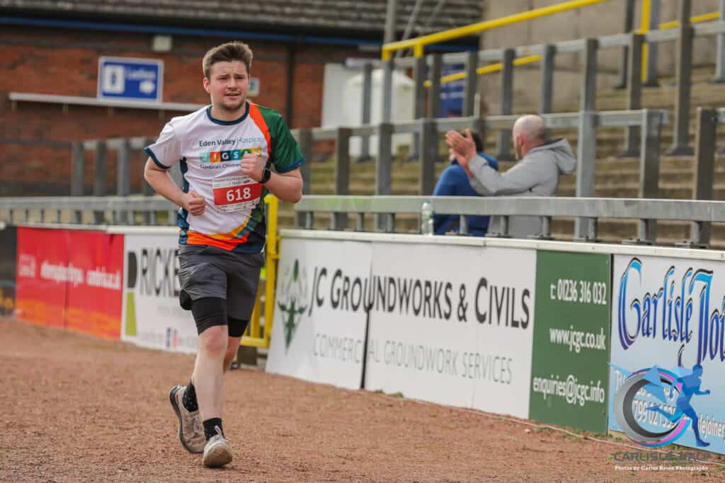 One of our runners completing the Carlisle Half Marathon