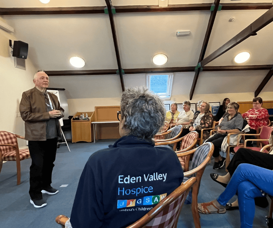 John Barrie performing a talk.